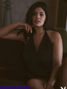 Solo model Jocelyn Corona bares her great tits during a Playboy shoot