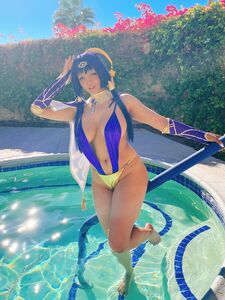 Pattie Cosplay poses by the pool